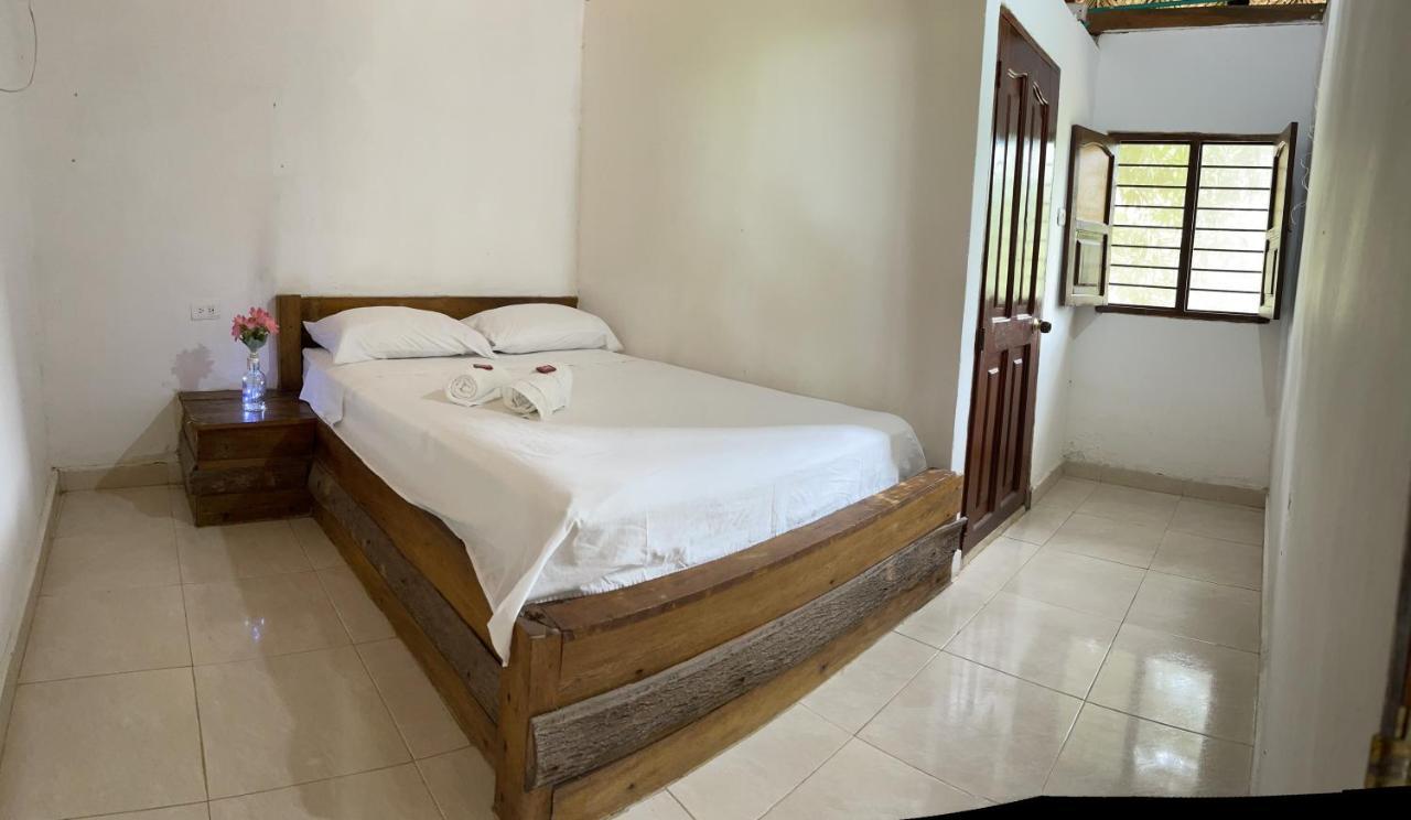 Ecohostal Palmares Del Rio Guachaca Exterior photo